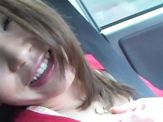 Horny Japanese Dame Is Showcasing Her Lovely Titties In The Car